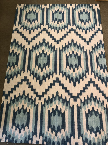 Blue on blue diamond design rug
