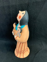 Jemez Pueblo Storyteller by artist D. Lucero; 6 1/2” tall; 2 children